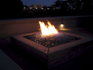 Outdoor fire pit ideas using fire glass. Modern outdooor fireplace