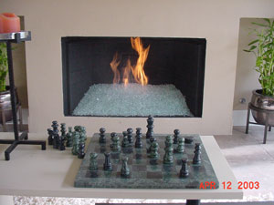 Picture samples of modern fire glass fireplaces and garden fire pits.