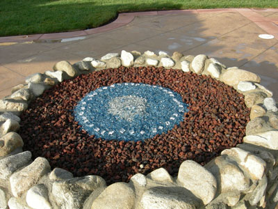 Lava Rock Into A Modern Glass Fire Pit, How Much Lava Rock For Fire Pit