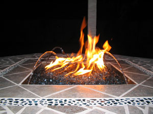 Fire table with water feature and fire glass Fire table with water feature and fire glass