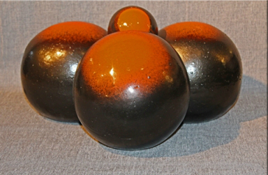 8 inch orange and dark brown fireball