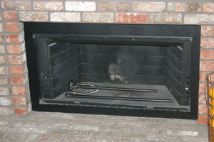 painted fireplace with custom burner