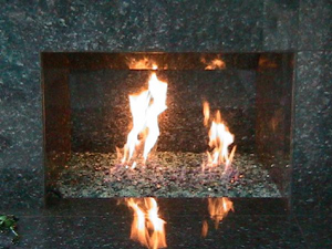 marble fireplace design using fire glass rocks